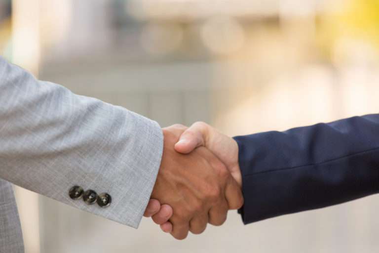 closeup-business-partners-handshake